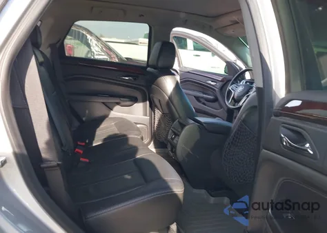 2016 Cadillac Srx Luxury Collection z USA, uszkodzony, nr VIN 3GYFNBE33GS582103